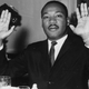 Martin Luther King Jr. holding his hands up in a restaurantTwitter